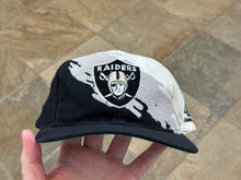 Load image into Gallery viewer, Vintage Los Angeles Raiders Logo Athletic Splash Snapback Football Hat