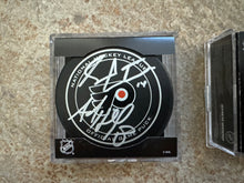 Load image into Gallery viewer, Philadelphia Flyers Autographed NHL Hockey Game Pucks, Claude Giroux ###