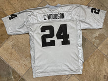 Load image into Gallery viewer, Vintage Oakland Raiders Charles Woodson Reebok Football Jersey, Size Large