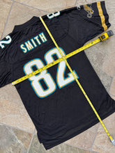 Load image into Gallery viewer, Vintage Jacksonville Jaguars Jimmy Smith Reebok Football Jersey, Size Medium