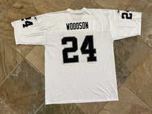 Load image into Gallery viewer, Vintage Oakland Raiders Charles Woodson Reebok Football Jersey, Size XL