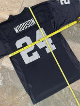 Load image into Gallery viewer, Vintage Oakland Raiders Charles Woodson Reebok Football Jersey, Size Medium