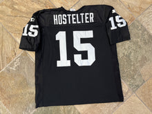Load image into Gallery viewer, Vintage Oakland Raiders Jeff Hostetler Starter Football Jersey, Size 48, L/XL