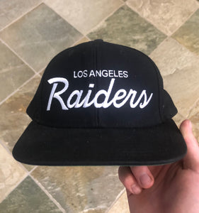 Los Angeles Raiders Reebok Throwback Script Snapback Football Hat