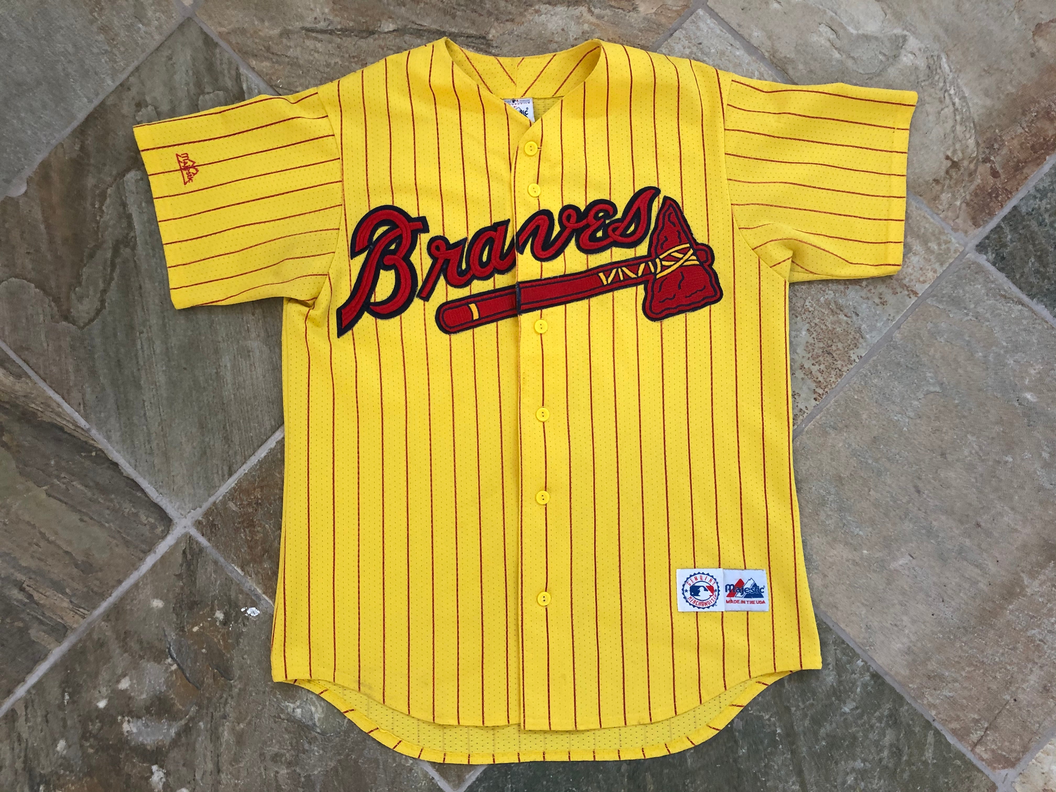 yellow baseball top