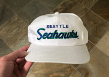 Load image into Gallery viewer, Vintage Seattle Seahawks Sports Specialties Script SnapBack Football Hat