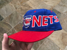 Load image into Gallery viewer, Vintage New Jersey Nets AJD Tri-Panel SnapBack Basketball Hat