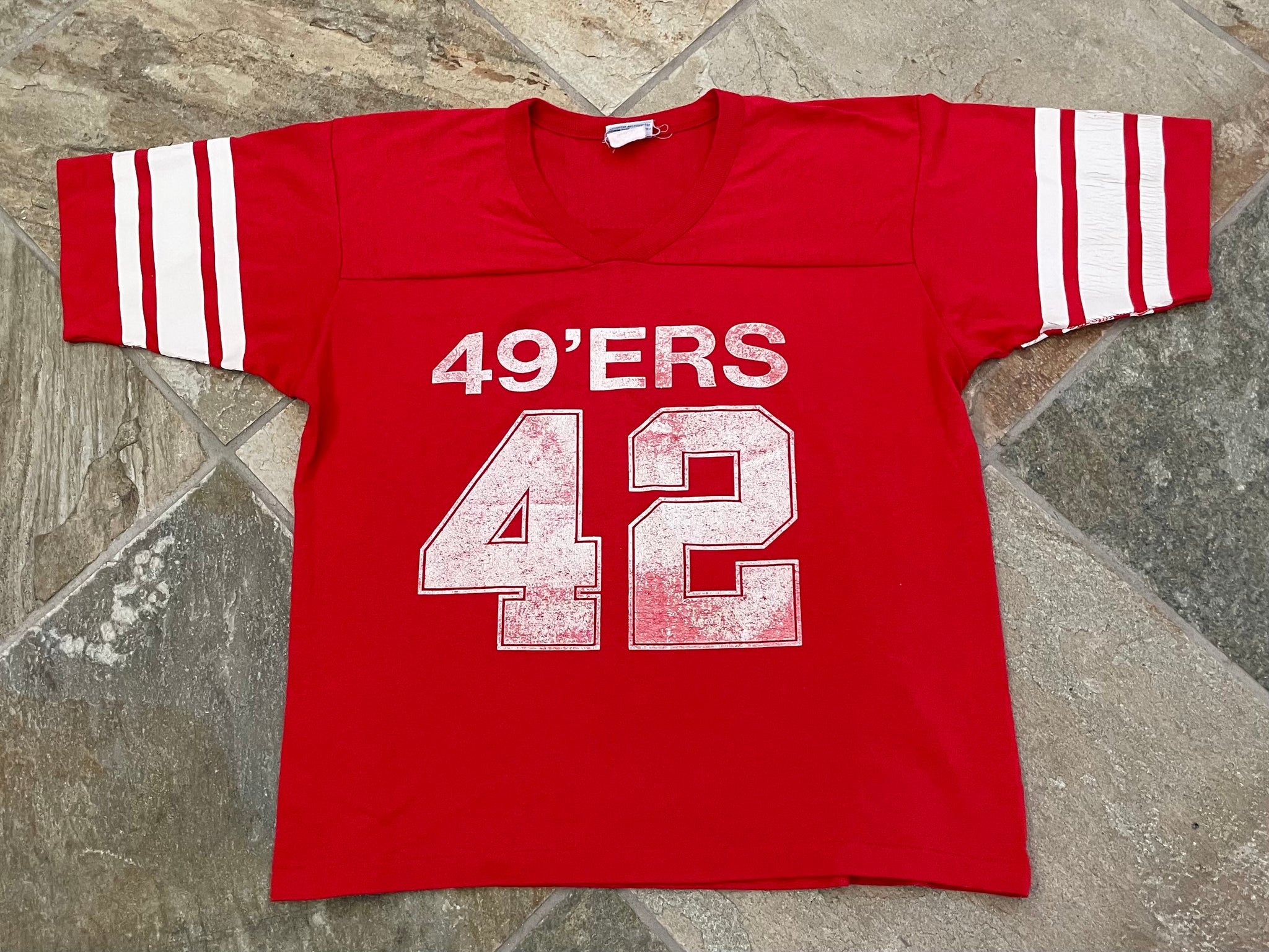 Vintage San Francisco 49ers Salem Sportswear Ronnie Lott Football Tshi –  Stuck In The 90s Sports