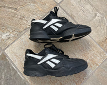 Above the online rim reebok shoes